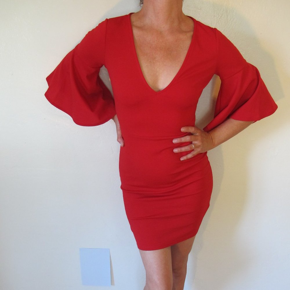 Bebe red, three quarter flared sleeve mini dress.
